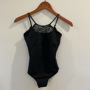 Women’s black size S Mirella leotard.